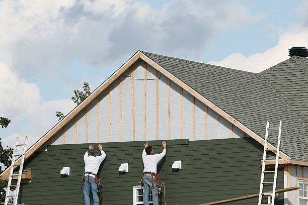 Professional Siding technician working in River Forest, IL
